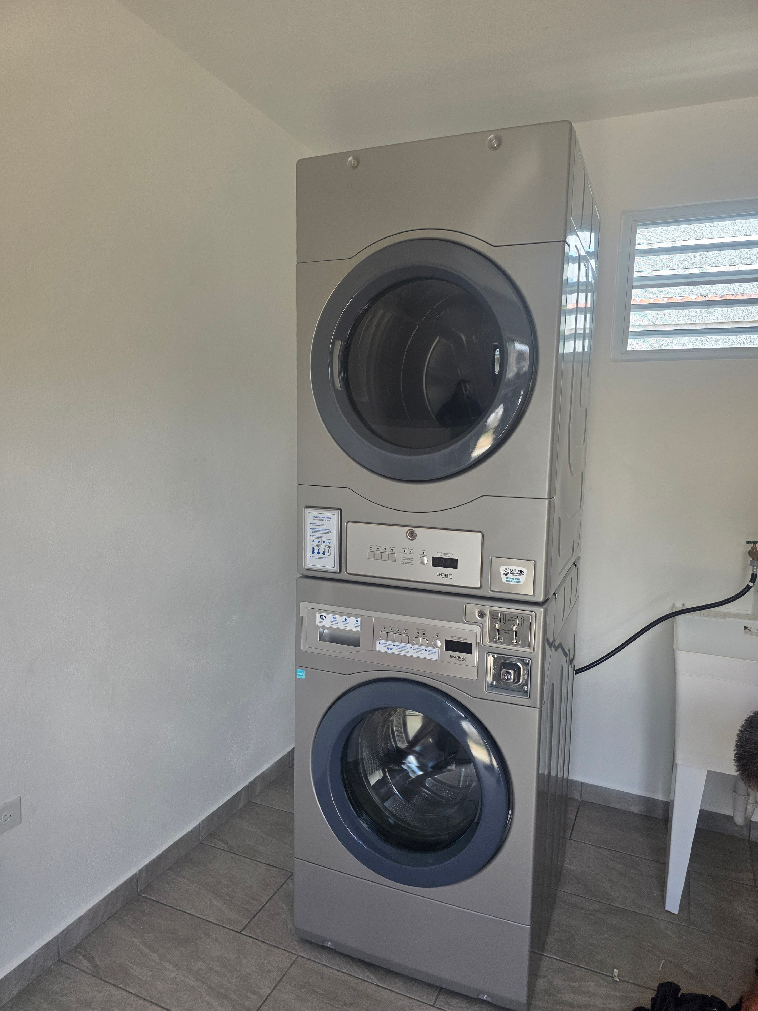 Stacked silver commercial dryers